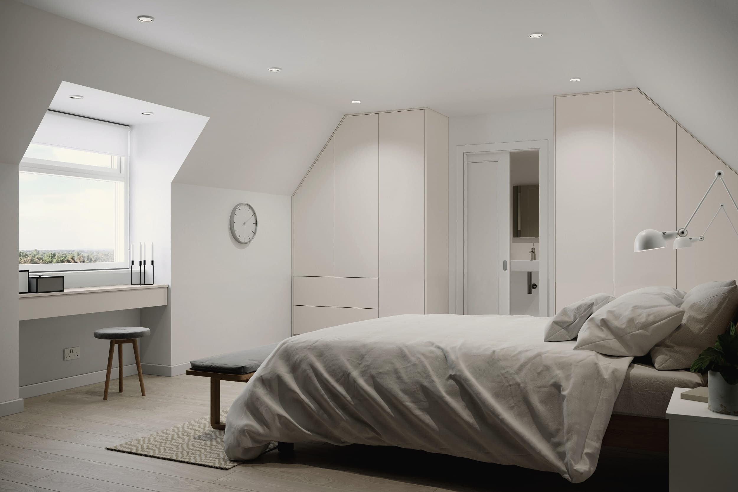 Charcoal shaker fitted wardrobes built up to and scribed around a sloping ceiling, with long brass bar handles