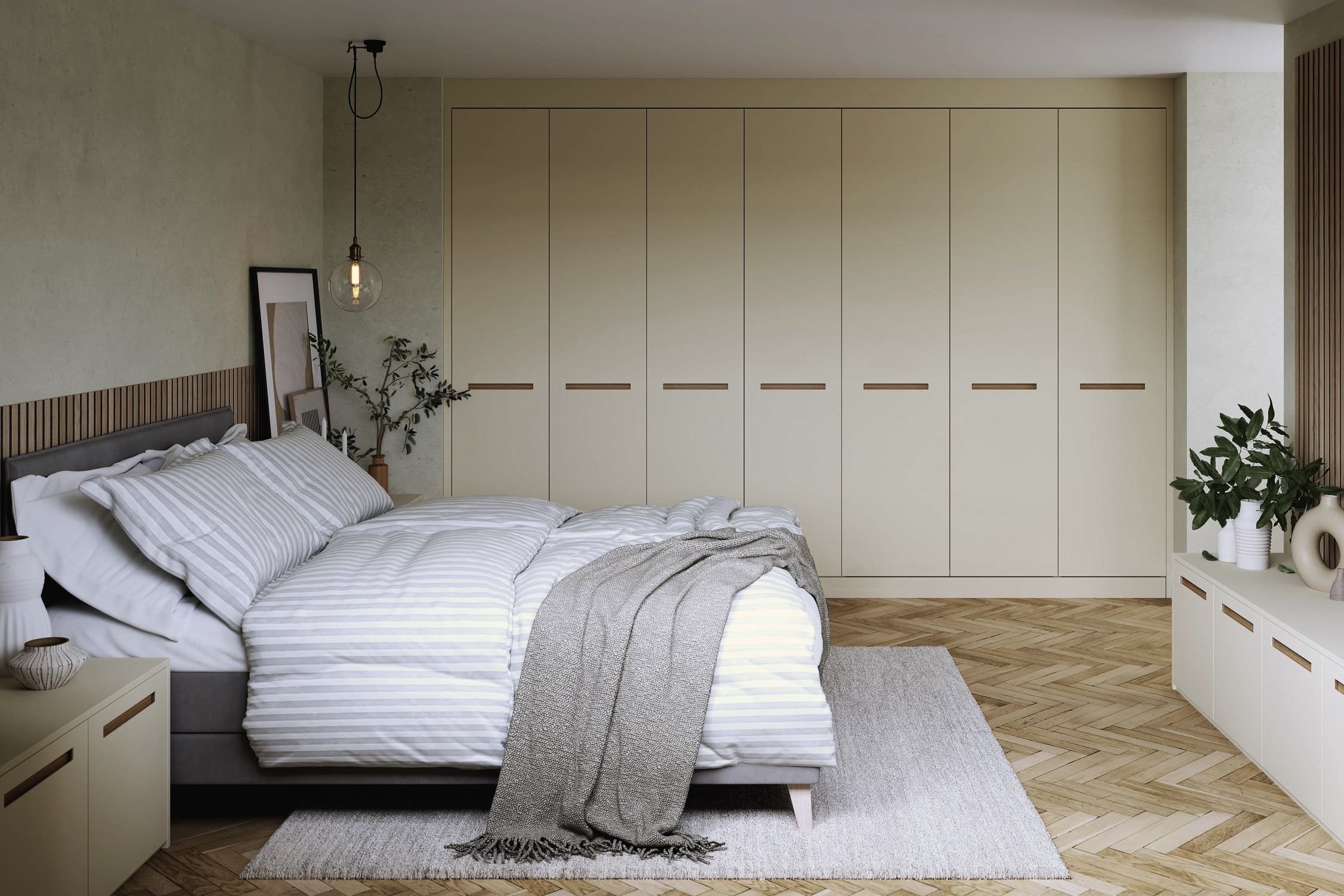 A fitted bedroom from the Second Nature Porter range with a full wall of wardrobes behind the bed