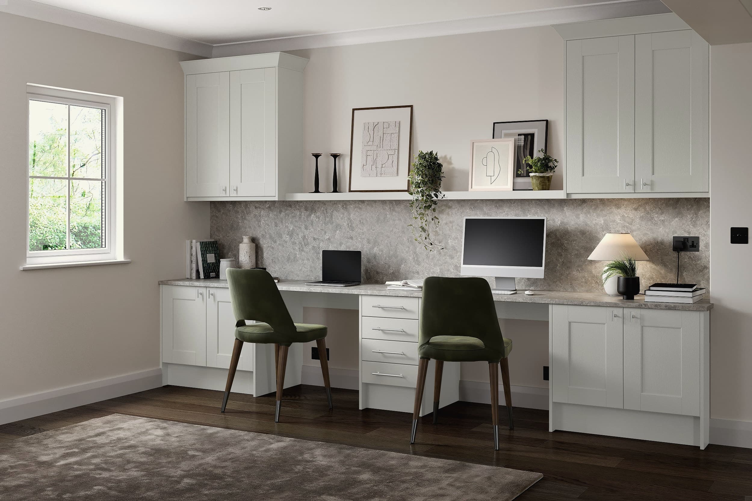 A fitted study in pale blue-grey shaker: a long oak desk against an oak slat wall with floating shelves, and a bank of drawers beneath